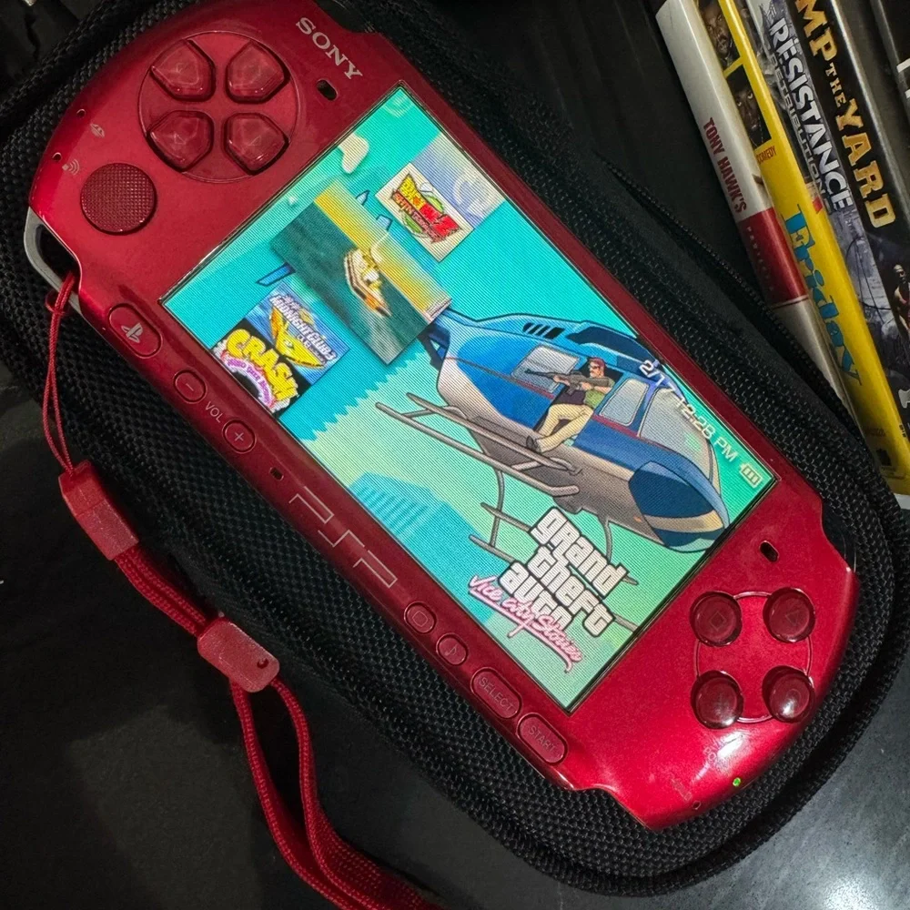 Sony PSP Vibrant Red Handheld Console with Games